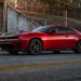 The Dodge Charger has always been more than just a car. For decades, it has represented American muscle in its loudest, boldest form. But today, the Charger finds itself at the center of one of the automotive industry's biggest transitions, balancing tradition with a future increasingly shaped by electrification. For 2027, Dodge isn't reinventing the Charger. Instead, it's refining what already exists. The latest updates bring more personalization options, a useful charging upgrade for EV owners, and a pricing strategy that is likely to get enthusiasts talking. And not necessarily in a good way. Daytona EV Gets a Serious Price Increase The biggest headline for the 2027 Charger isn't a new engine, more power, or a special edition model. It's the price tag. Dodge has significantly increased the cost of its all-electric Charger Daytona lineup. The two-door Daytona Scat Pack now costs $12,500 more than before, while the four-door version sees an $11,000 jump. That's a substantial increase in a market where many EV manufacturers are lowering prices or offering incentives to attract buyers. What's particularly interesting is that Dodge has left the prices of its gasoline-powered SIXPACK models untouched. For shoppers comparing both versions, that gap has suddenly become much wider. The Hurricane Six Still Carries the Torch Under the skin, very little changes for 2027. The Charger R/T SIXPACK continues with its twin-turbocharged 3.0-liter Hurricane inline-six producing 420 horsepower. Step up to the Scat Pack SIXPACK and output rises to 550 horsepower. While some traditionalists still miss the old Hemi V8, there's no denying the Hurricane engine delivers serious performance. Both versions come standard with all-wheel drive and feature a selectable rear-wheel-drive mode, allowing drivers to enjoy the kind of tail-happy character muscle car fans love. The Daytona EV also carries over unchanged mechanically. Its 670-horsepower setup remains one of the most powerful offerings in the segment, complete with Dodge's PowerShot boost function and the controversial Fratzonic exhaust system that attempts to bring some drama to the electric driving experience. More Personality Straight From The Factory One area where Dodge clearly listened to customers is personalization. For 2027, buyers can choose from more than 25 new factory options. New Petrol Blue leather seats, Demonic Red seat belts, fresh Mopar stripe packages, Satin Black hoods, and additional Brembo brake caliper colors give owners more ways to make their Charger stand out. It's a smart move. Modern buyers increasingly want vehicles that reflect their personality, and Dodge is leaning into that trend without changing the core formula. A Small Upgrade That Could Make a Big Difference While styling upgrades grab attention, one practical addition may end up being the most important. The Charger Daytona now comes equipped with a built-in NACS charging port, giving owners direct access to Tesla's extensive Supercharger network without needing an adapter. For EV buyers, convenience often matters as much as performance. Access to a larger charging network instantly makes road trips and daily ownership easier, and that could help make the Daytona a more compelling proposition. The Hemi-Sized Question Still Lingers Of course, no Charger conversation is complete without mentioning the missing Hemi. Despite persistent rumors and growing demand from enthusiasts, Dodge has once again chosen not to bring back a V8-powered Charger for 2027. Instead, the company remains committed to its strategy of offering both electric and Hurricane-powered six-cylinder options. Yet for many longtime fans, the Charger still feels incomplete without the unmistakable rumble of a Hemi under the hood. Rumors suggest a V8-powered comeback could happen later in the decade, potentially even opening the door for a future Hellcat. Until then, Dodge is asking enthusiasts to embrace a new era of muscle cars. Whether buyers are ready for that future remains one of the most fascinating questions facing the brand today.