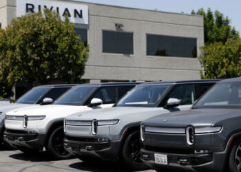 Rivian Announces Fresh Layoffs as EV Market Challenges Continue