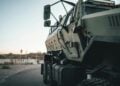 Handling seasonal gate peaks with automated vehicle access control